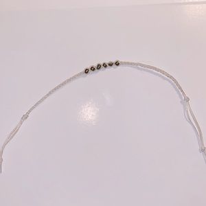 Handmade bracelet made with hemp cord and 6 beads.